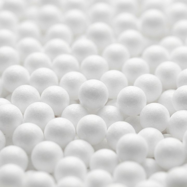 Macro close-up of round white expanded polystyrene refill beads
