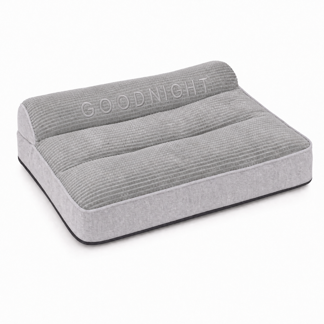 Plush orthopaedic dog bed with raised bolster, grey