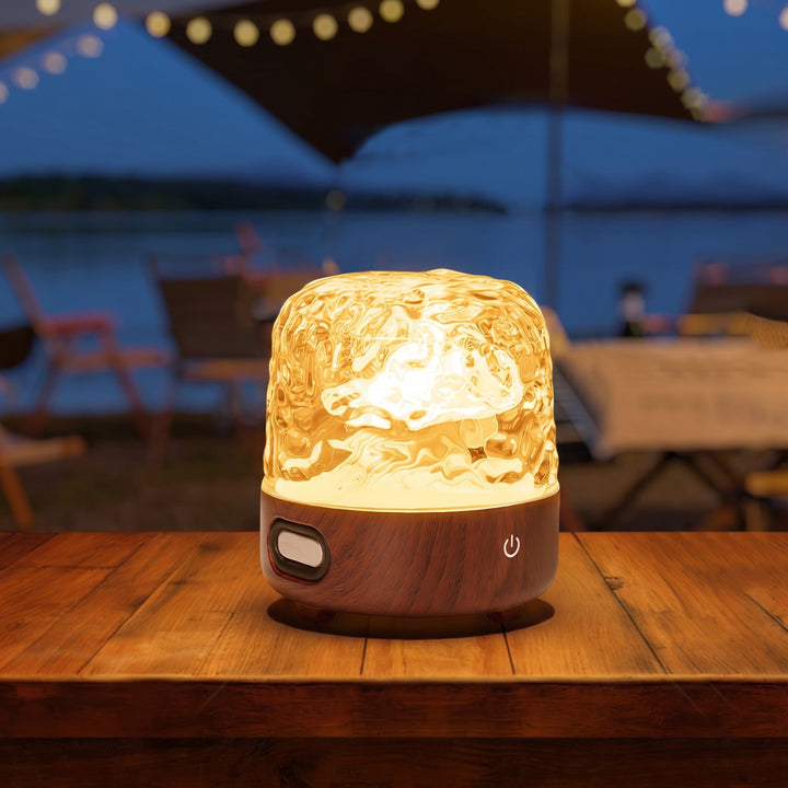 Crystal ripple lamp on a table outdoors at dusk